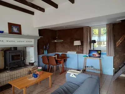 Coin salon dans l'établissement Gite Bleu