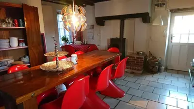 Coin salon dans l'établissement Gite Rouge and la Ferme Blanche