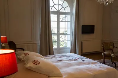 Un ou plusieurs lits dans un hébergement de l'établissement Chateau des Monts