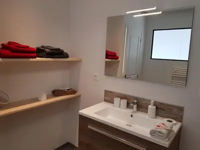 Salle de bains dans l'établissement Normandy VIP