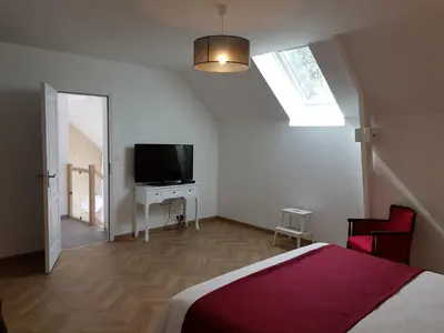 Télévision ou salle de divertissement dans l'établissement Normandy VIP