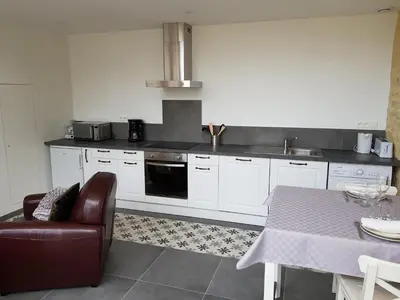 Cuisine ou kitchenette dans l'établissement Normandy VIP