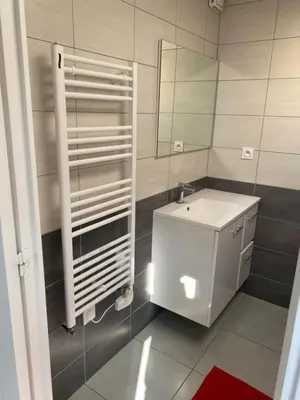 Salle de bains dans l'établissement Au Rythme des Vagues
