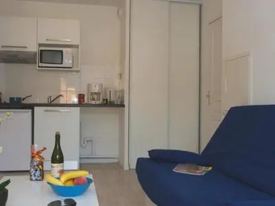 Cuisine ou kitchenette dans l'établissement Les Isles de Sola apartment in Grandcamp