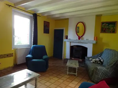 Coin salon dans l'établissement Cottage in Normandy near Barneville-Carteret