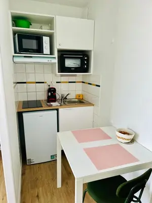 Cuisine ou kitchenette dans l'établissement Sphinx Résidences - Tempologis Mémorial