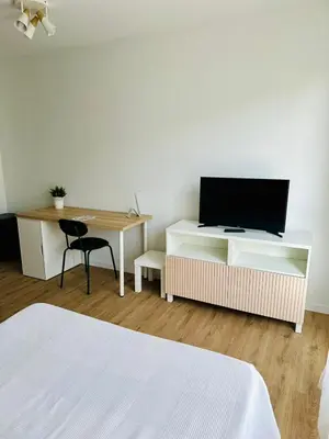Télévision ou salle de divertissement dans l'établissement Sphinx Résidences - Tempologis Mémorial