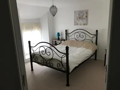 Un ou plusieurs lits dans un hébergement de l'établissement Orchid Cottage