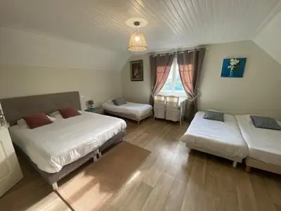 Un ou plusieurs lits dans un hébergement de l'établissement B&B de Saint Come de Fresné