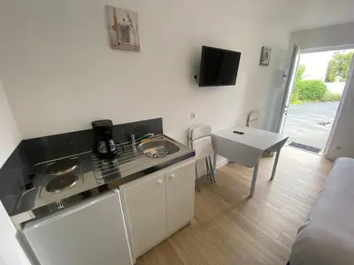 Cuisine ou kitchenette dans l'établissement B&B de Saint Come de Fresné