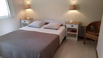 Un ou plusieurs lits dans un hébergement de l'établissement Chambres d'Hôtes Côté Campagne