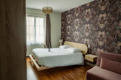 Un ou plusieurs lits dans un hébergement de l'établissement LOGIS -Hotel & Restaurant de la Place