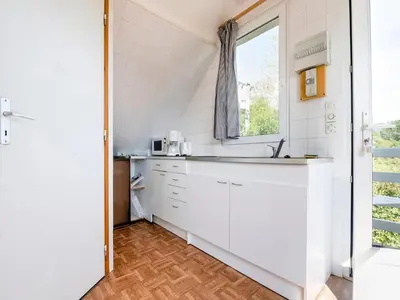 Cuisine ou kitchenette dans l'établissement Apartment in Saint-Rémy near Lake