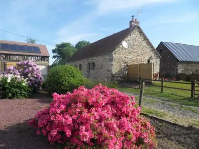 Jardin de l'établissement Charmante maison écologique avec jardin clos - FR-1-497-7