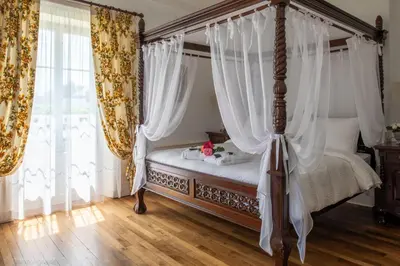 Un ou plusieurs lits dans un hébergement de l'établissement Maison d'hôtes de charme La Rose de Ducey près du Mont Saint Michel