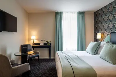 Un ou plusieurs lits dans un hébergement de l'établissement Best Western Plus Le Moderne