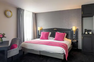 Un ou plusieurs lits dans un hébergement de l'établissement Best Western Plus Le Moderne