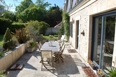 Jardin de l'établissement Gîte La Mansarde 8 personnes