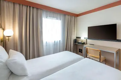 Un ou plusieurs lits dans un hébergement de l'établissement Sure Hotel by Best Western Caen Memorial
