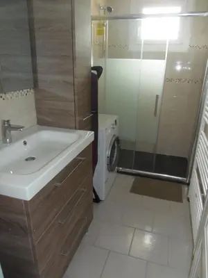Salle de bains dans l'établissement maison de vacances