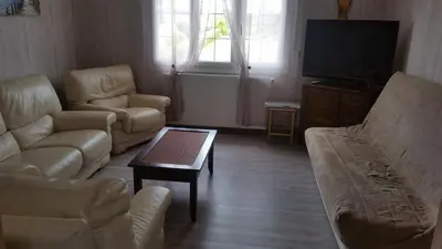 Coin salon dans l'établissement maison de vacances
