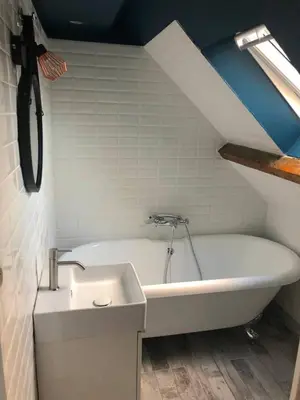 Salle de bains dans l'établissement Le Duplex