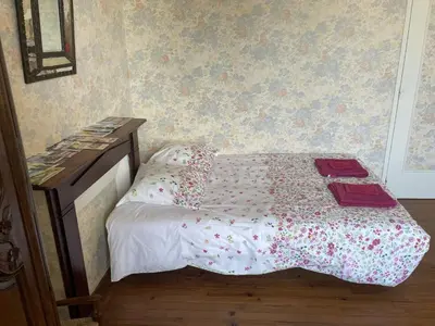 Un ou plusieurs lits dans un hébergement de l'établissement B&B Chambres d'hôtes Ferme Mahyas