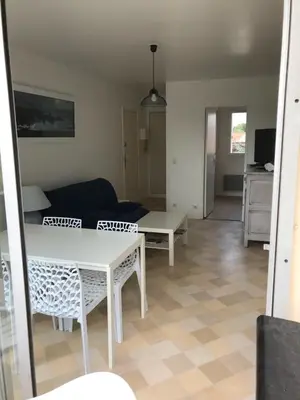 Coin salon dans l'établissement Cabourg T2 proche plage