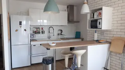 Cuisine ou kitchenette dans l'établissement Appartement dernier étage Hyper Centre