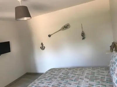 Un ou plusieurs lits dans un hébergement de l'établissement Gîtes des champs & Spa