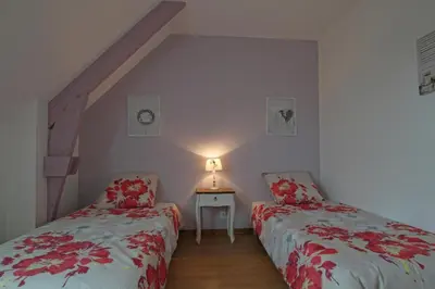 Un ou plusieurs lits dans un hébergement de l'établissement La Ferme d' Emerentine