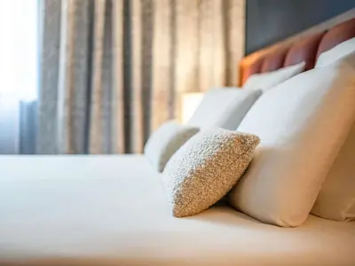 Un ou plusieurs lits dans un hébergement de l'établissement Mercure Caen Cote De Nacre