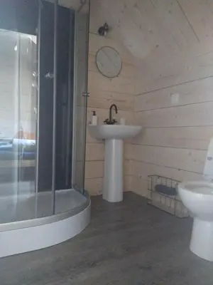 Salle de bains dans l'établissement KERFLAVEUR