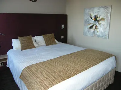 Un ou plusieurs lits dans un hébergement de l'établissement CIT'HOTEL Saint-Pierre