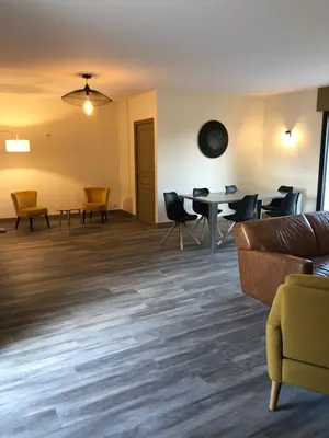 Coin salon dans l'établissement Le domaine de la carperie