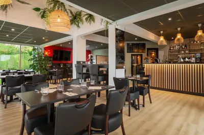 Restaurant ou autre lieu de restauration dans l'établissement Zenith Hotel Caen