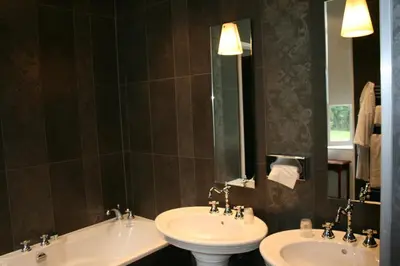 Salle de bains dans l'établissement Château de Bellefontaine - Teritoria