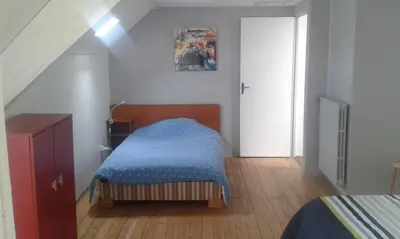 Un ou plusieurs lits dans un hébergement de l'établissement Gîte à 50m de la mer par chemin piétonnier !