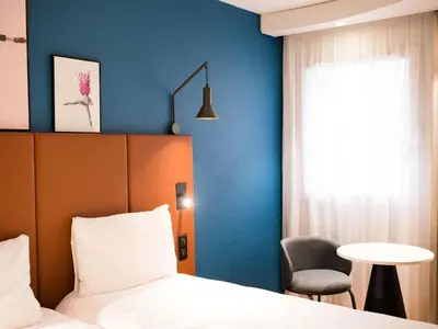 Un ou plusieurs lits dans un hébergement de l'établissement ibis Caen Centre