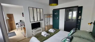 Télévision ou salle de divertissement dans l'établissement CHAMBRE AVEC SUITE DE 26 M2