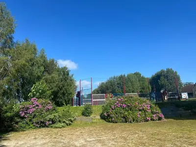 Jardin de l'établissement Appartement charmant à La Ferrière-aux-Étangs avec jacuzzi - 42 m²
