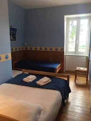 Un ou plusieurs lits dans un hébergement de l'établissement villa Canthar