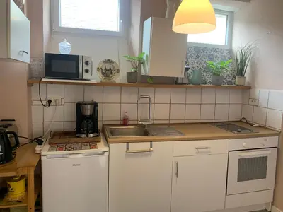 Cuisine ou kitchenette dans l'établissement Appartement familial le Tanis