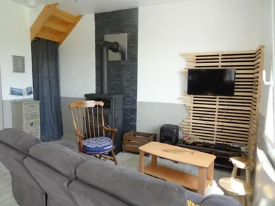 Télévision ou salle de divertissement dans l'établissement Holiday Home in France by Sandy Beach
