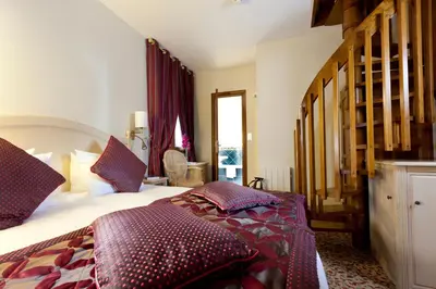 Un ou plusieurs lits dans un hébergement de l'établissement Auberge Saint Pierre