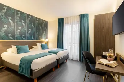 Un ou plusieurs lits dans un hébergement de l'établissement Best Western Royal Hotel Caen