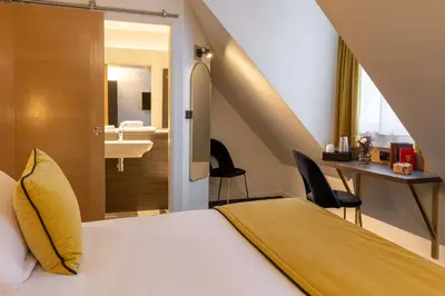 Un ou plusieurs lits dans un hébergement de l'établissement Best Western Royal Hotel Caen