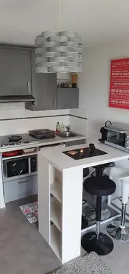 Cuisine ou kitchenette dans l'établissement Résidence Front de mer Cabourg - Accès direct plage