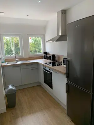 Cuisine ou kitchenette dans l'établissement gîte du parc du moulin du pré
