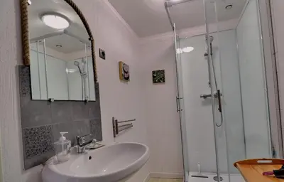 Salle de bains dans l'établissement Chambres d'Hôtes Les Fleurettes en Baie Du Mont Saint Michel